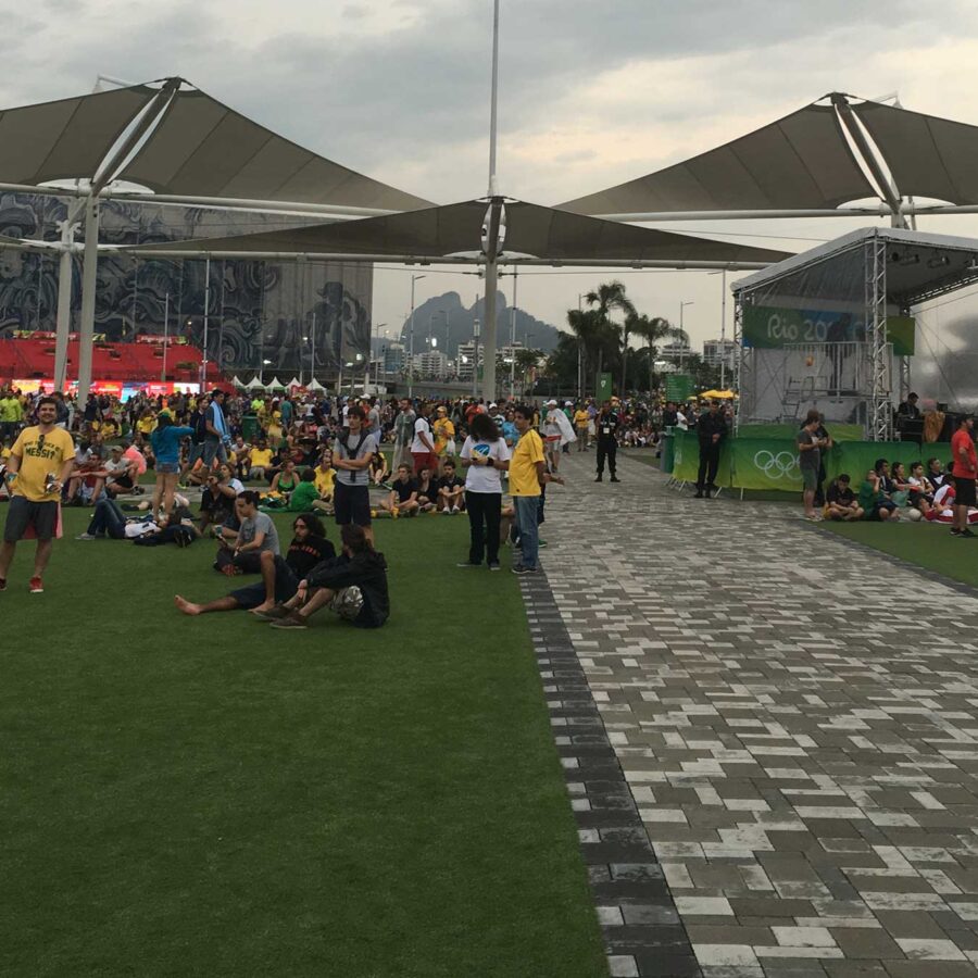 Brazilian fans mill about in the Olympic Park in Rio de Janeiro, Brazil before the men's soccer final