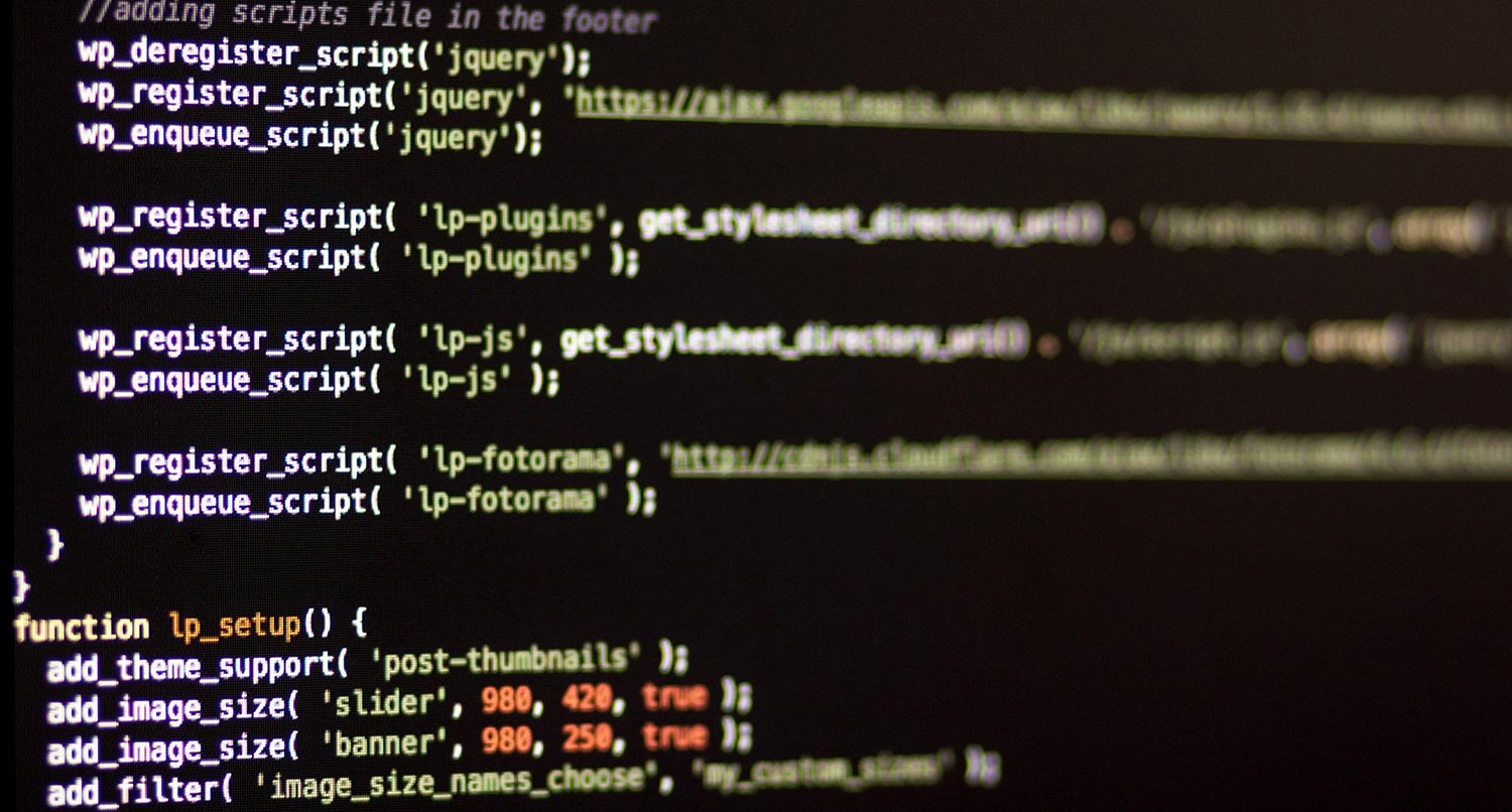 photo of a computer screen showing code for a WordPress full site editing theme