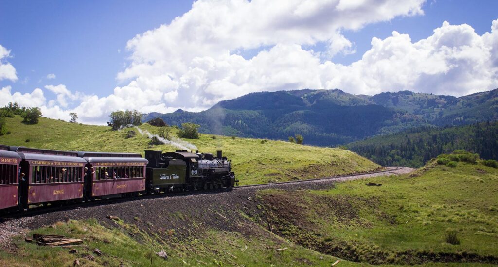 A train travels in the mountains