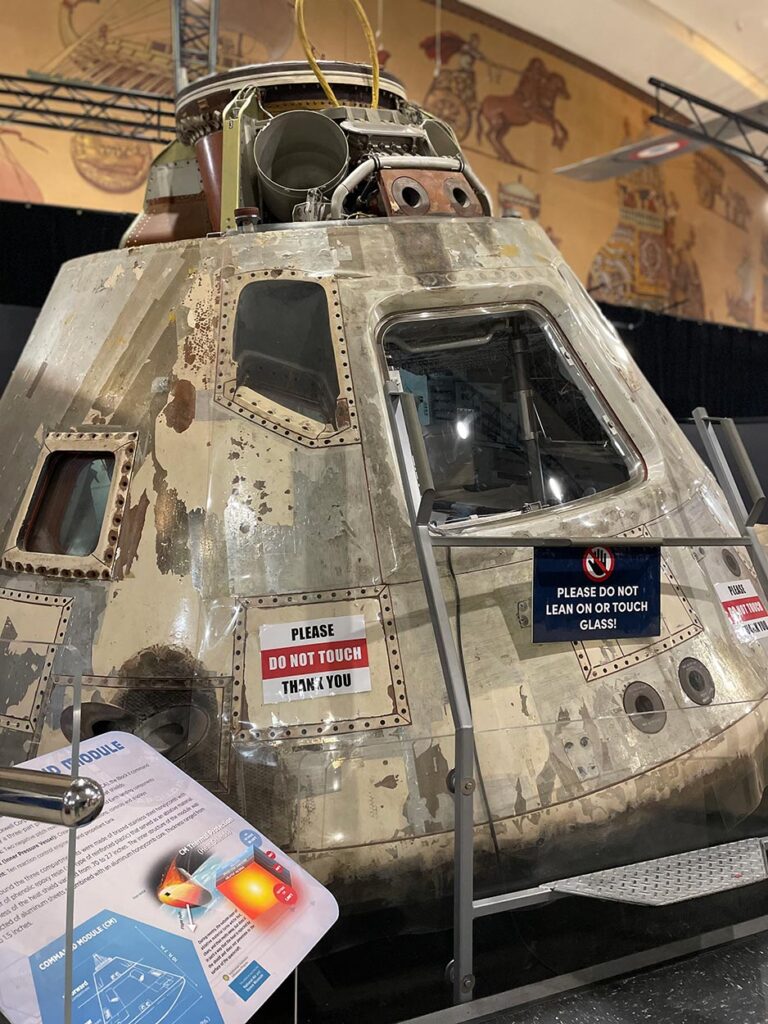 A NASA landing capsule in a museum