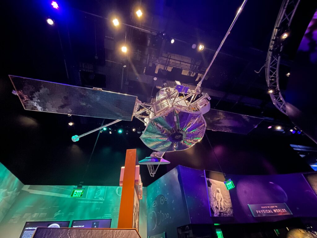 A satellite hanging in a museum